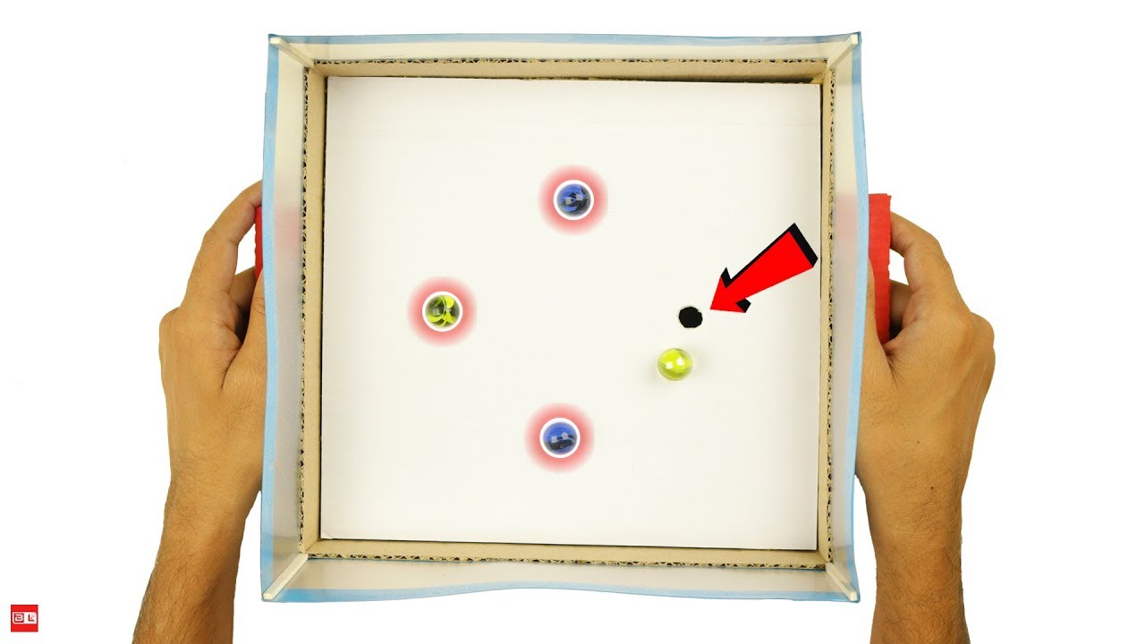 How to make interesting marbles and holes game from Cardboard 